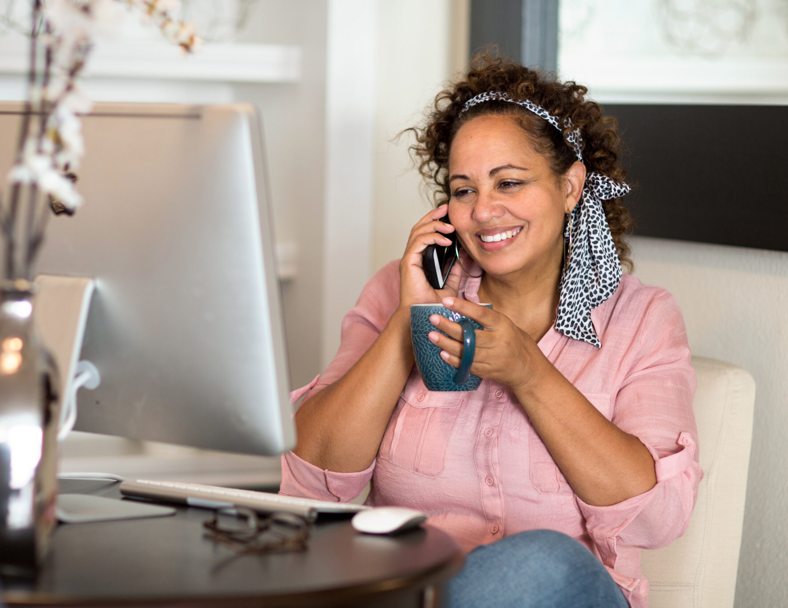 Woman working from her home office.